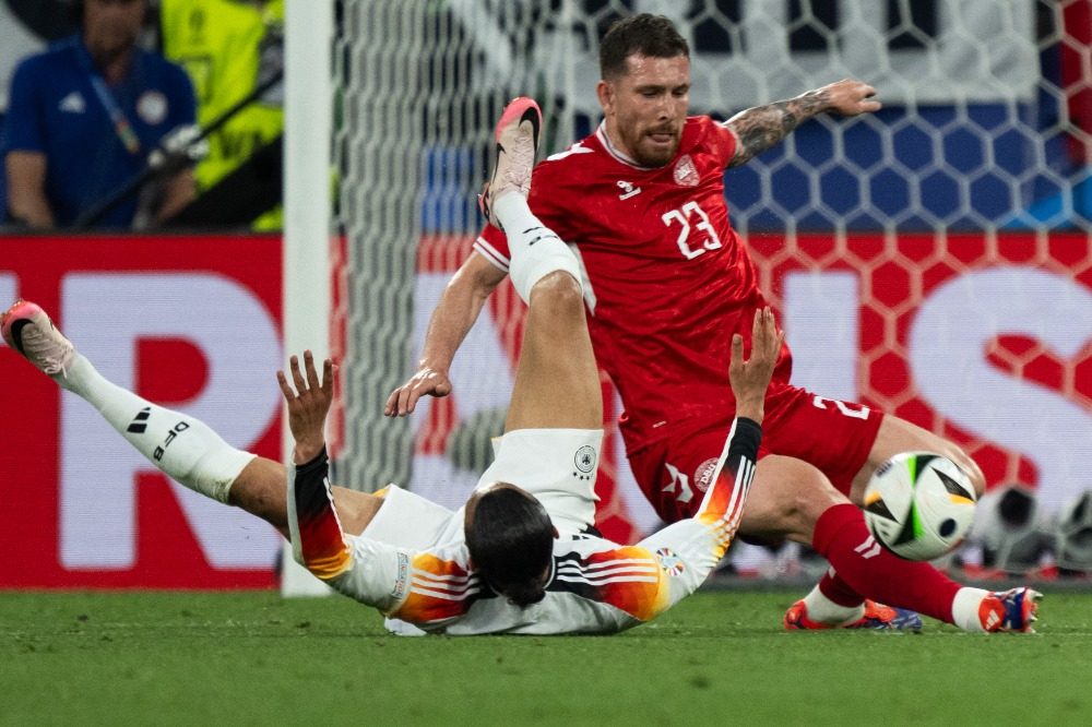 德国险胜丹麦，萨内刷新纪录的简单介绍